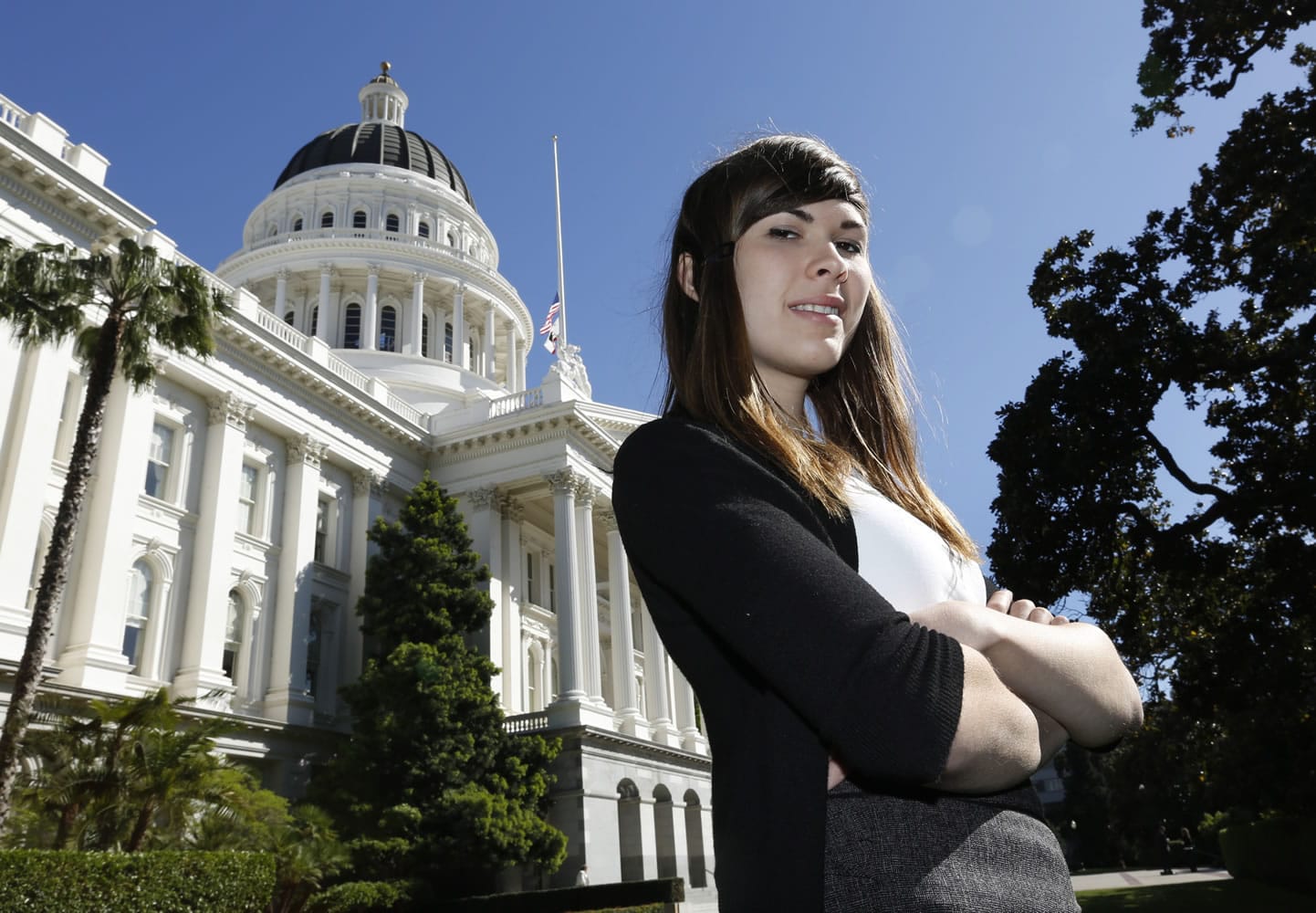 Eli Erlick, 17, stands outside the Capitol building in Sacramento, Calif. on April 17 after testifying before an education committee. Erlick is the director of an organization called Trans Student Equality Resources, which provides schools with training and information about students like her. Among other things, the group explains gender differences and how students transition, including name and pronoun changes.
