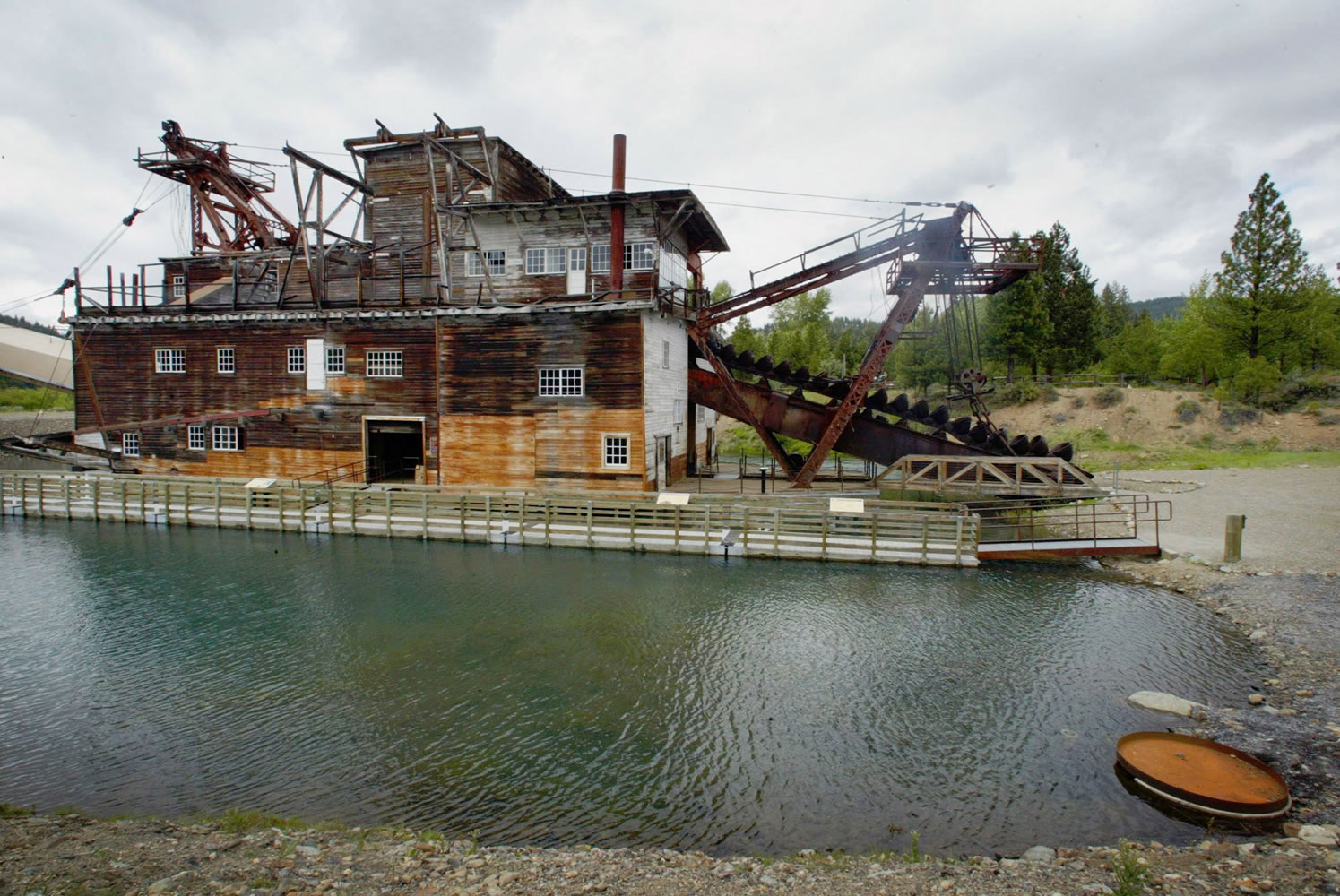 The Sumpter dredge, here in June 2004, was one of three that took some 9 tons of gold from the Sumpter Valley in Oregon. A ghost-themed reality TV show that was made last summer near Sumpter is scheduled to debut Jan. 16 on the Syfy network.