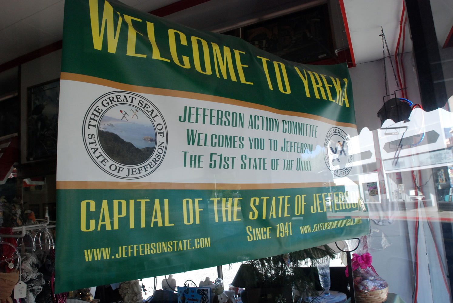 A banner in the window of a downtown Yreka, Calif., business welcomes visitors to the State of Jefferson.