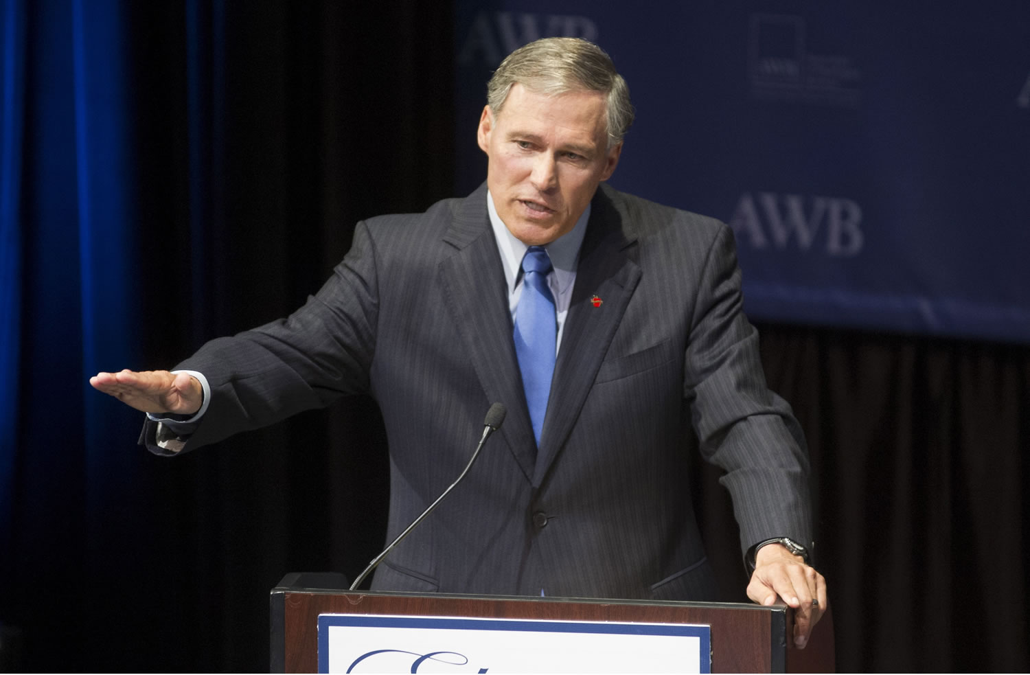 Former Rep. Jay Inslee participates in a debate at the Bing Crosby Theater in Spokane.
