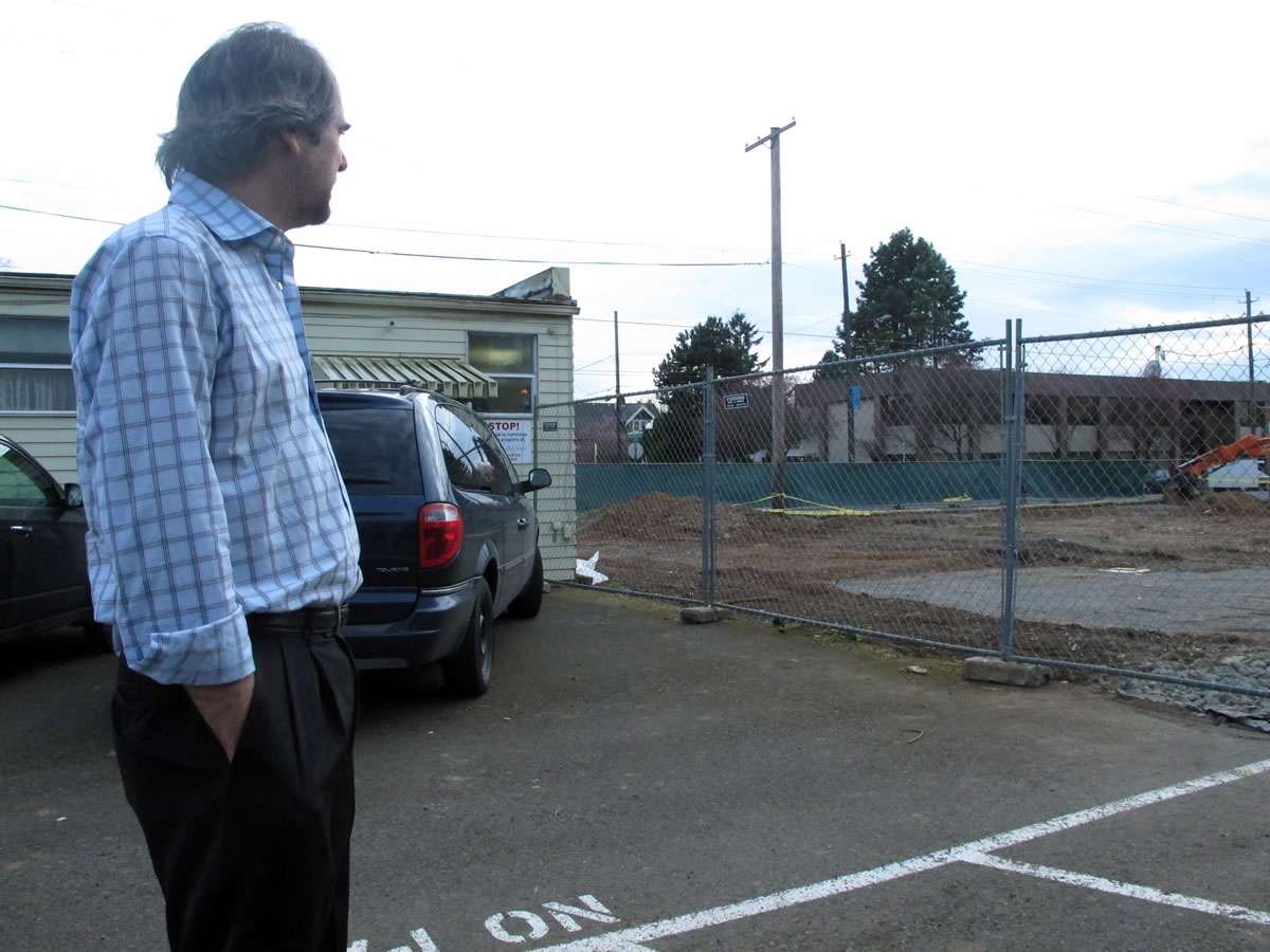 John Golden, an opponent of a plan to build a four-story apartment building that comes with no parking spaces, explains the potential fight for spaces if the building is constructed in Portland.