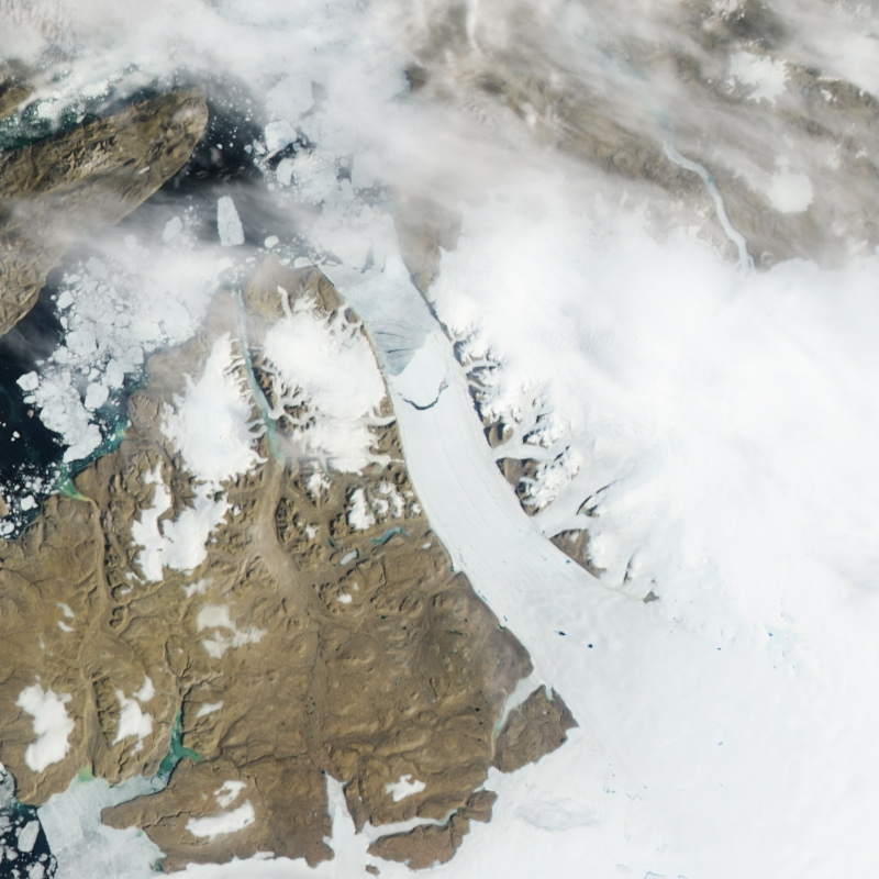This satellite image taken Monday shows a crescent-shaped crack, center, on the Petermann glacier in northwestern Greenland.