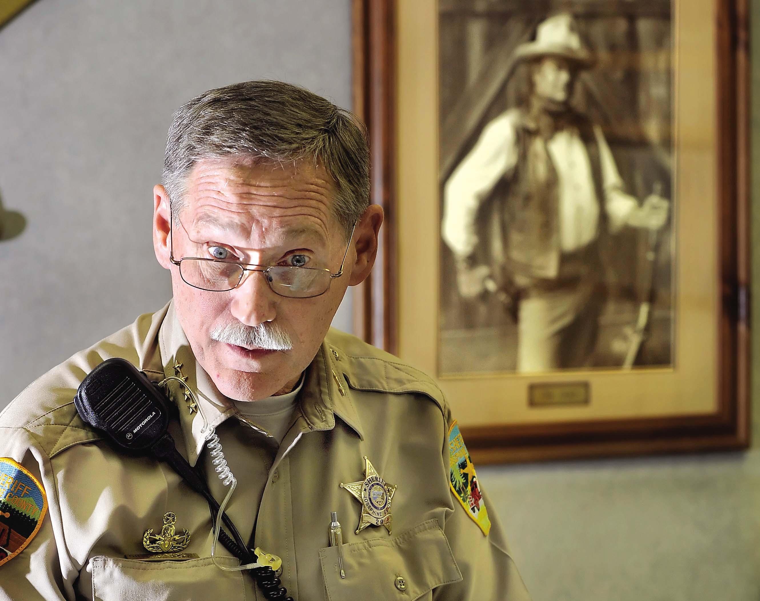 Josephine County, Ore., Sheriff Gil Gilbertson is one of a growing number of rural sheriffs and lawmakers vowing to ignore any new gun control legislation, or even make it a crime for federal officials to enforce federal gun policy.
