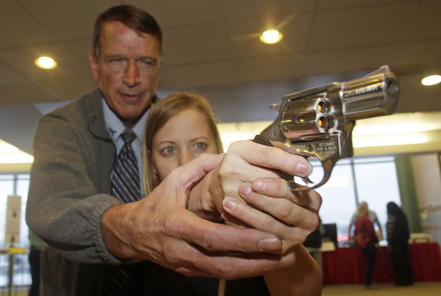 Cori Sorensen, a fourth-grade teacher from Highland Elementary School in Highland, Utah, receives firearms training in December with a .357 magnum from personal defense instructor Jim McCarthy in West Valley City, Utah, where teachers and administrators are allowed to bring guns to school.