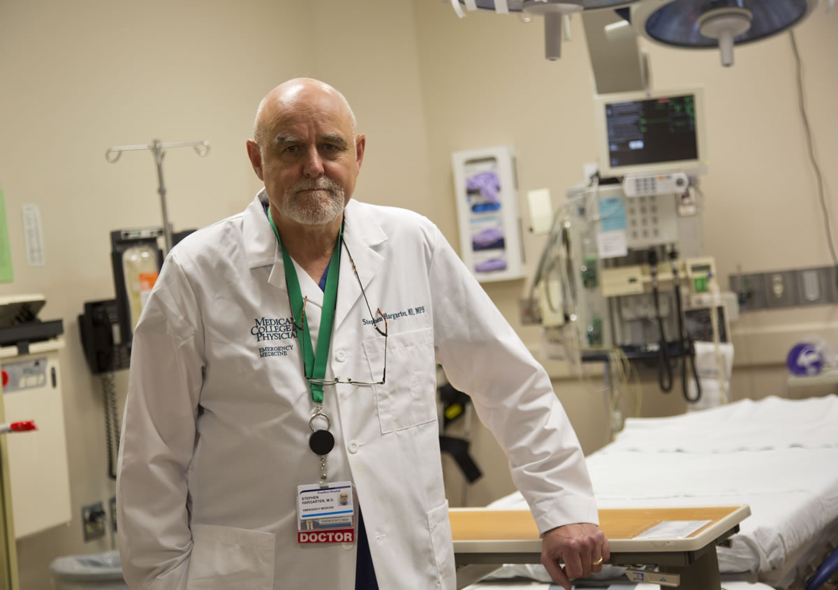 In this Aug. 8, 2012 photo, Dr. Stephen W. Hargarten poses for a photo in a trauma room at Froedtert &amp; Medical College of Wisconsin's emergency department in Milwaukee. Hargarten helped many of the victims of Sunday's shooting at the Sikh Temple of Wisconsin.