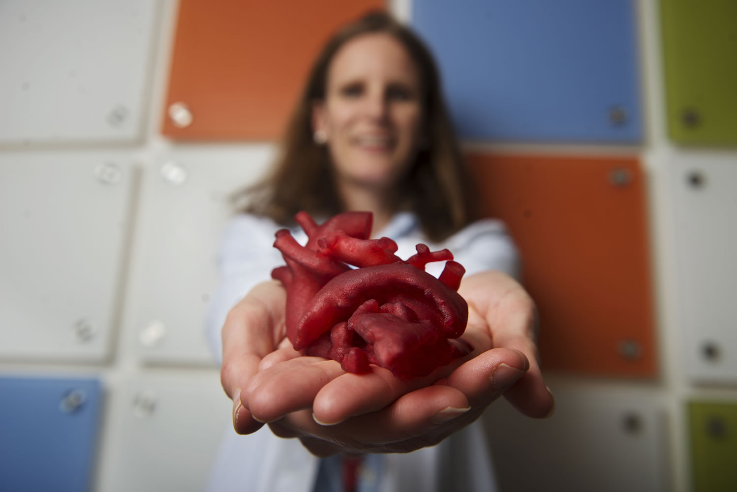 Laura Olivieri, a pediatric cardiologist at Children's National Medical Center in Washington, displays a heart model created by a 3-D printer.