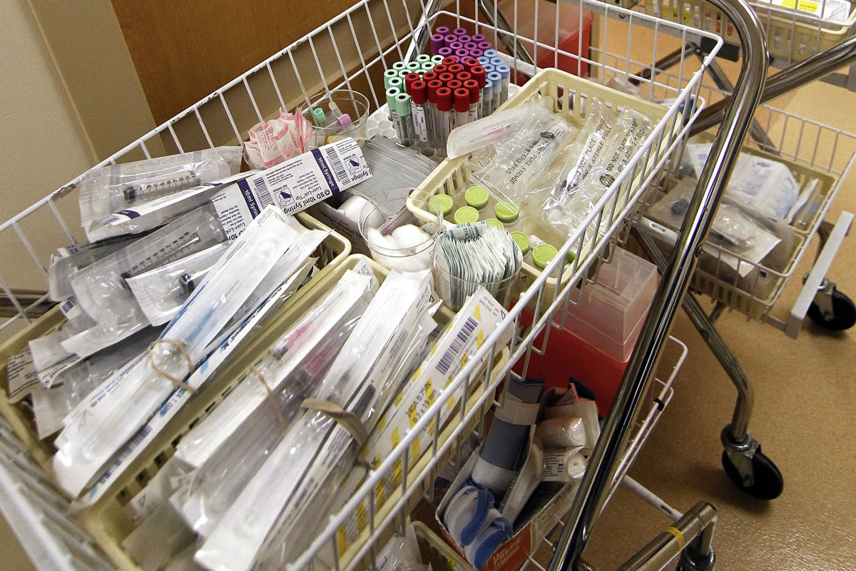 A basket of medical supplies await storage by King's Daughters Medical Center emergency room staff in Brookhaven, Miss.