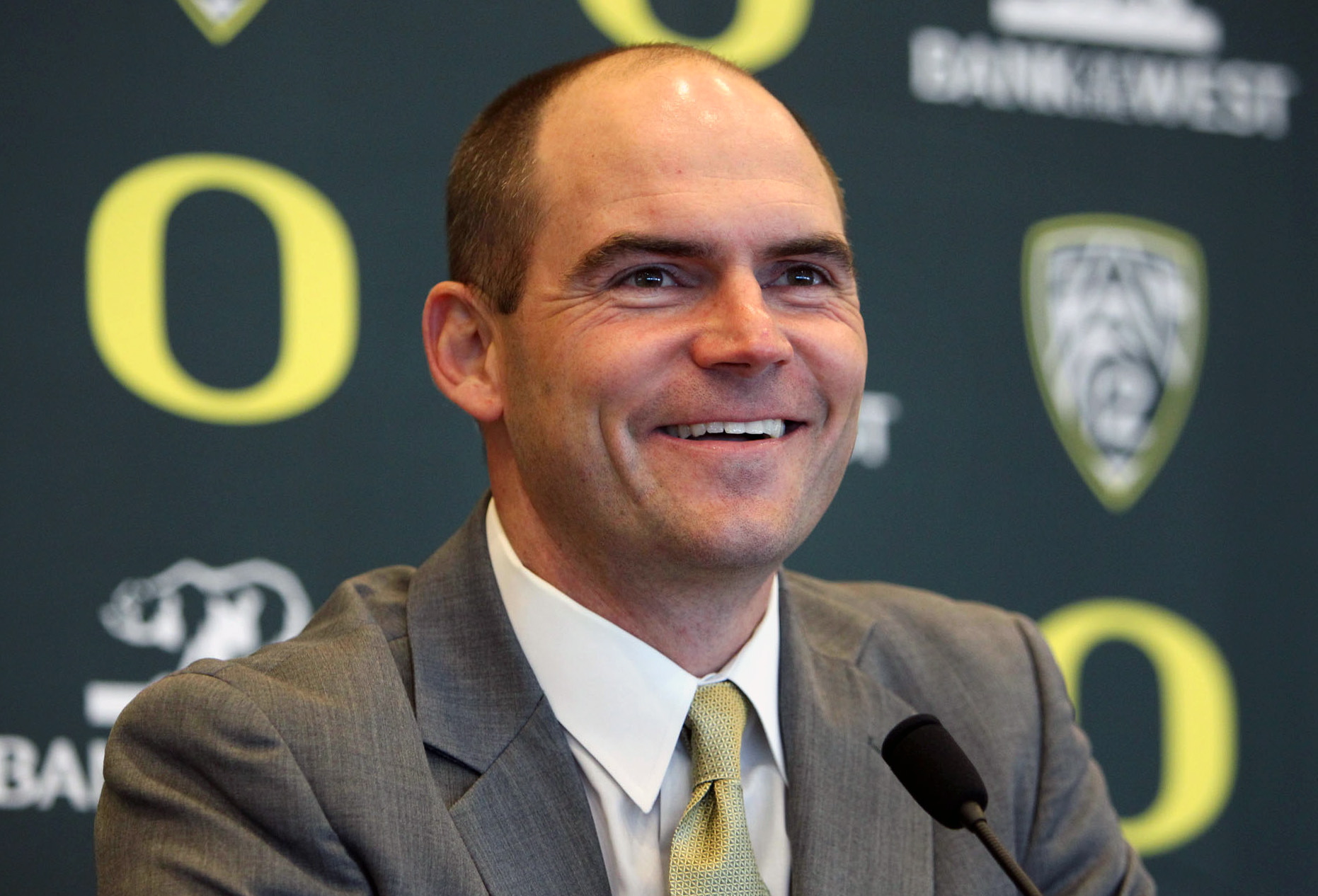 Mark Helfrich is introduced as Oregon's new head coach during a news conference in Eugene on Sunday.