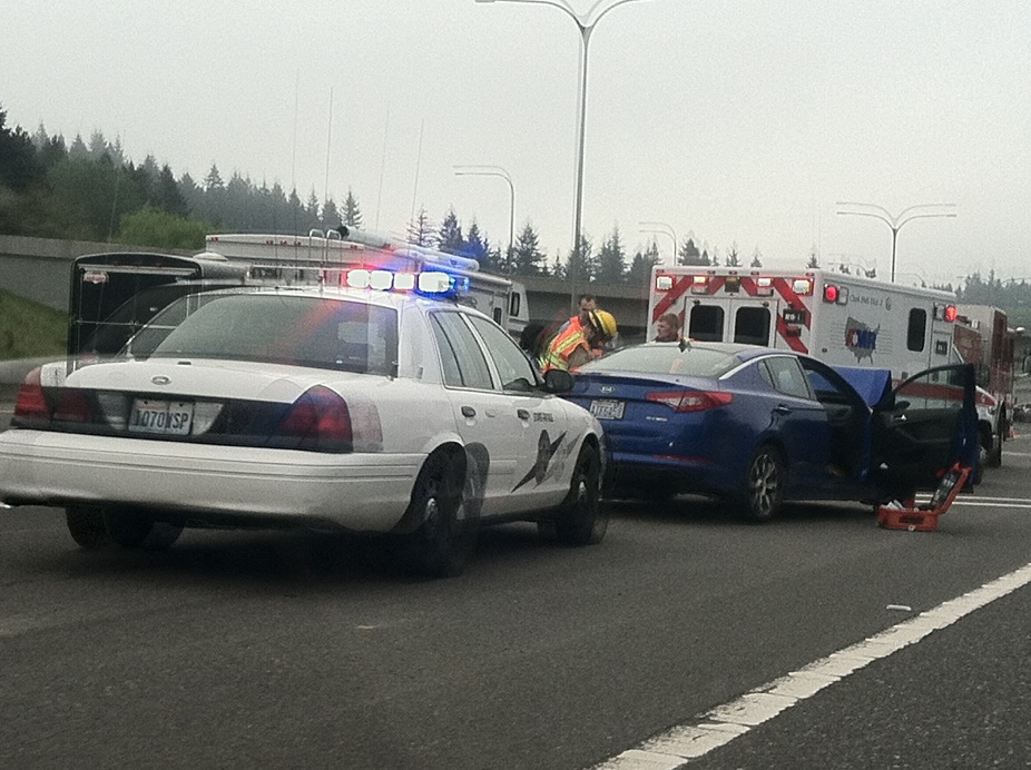 A semi tractor trailer and two cars crashed on Interstate 5 southbound at the Main Street exit.