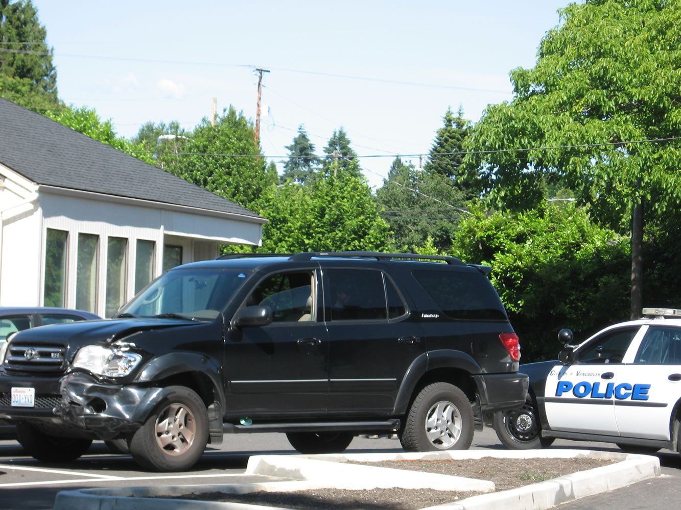 This damaged Toyota Sequoia, shown at the scene of a reported carjacking at 404 E.