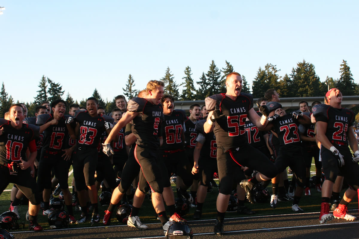 The Camas High School football players complete their pre-game &quot;Haka&quot; dance Friday, at Doc Harris Stadium.