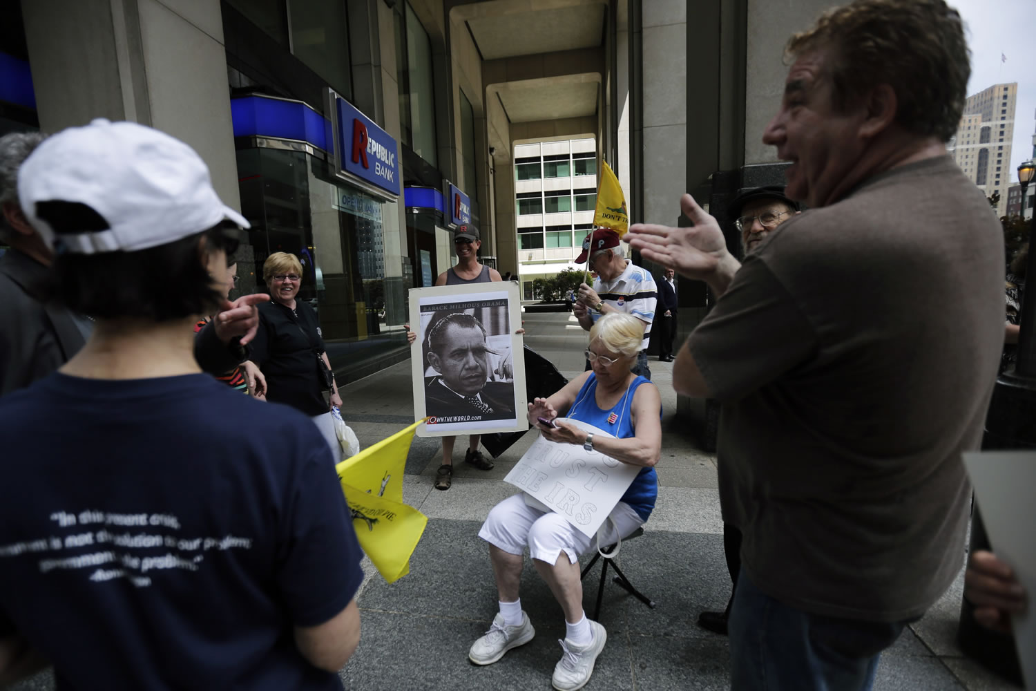 Protesters gather during a tea party rally against the extra IRS scrutiny of their groups Tuesday in Philadelphia.