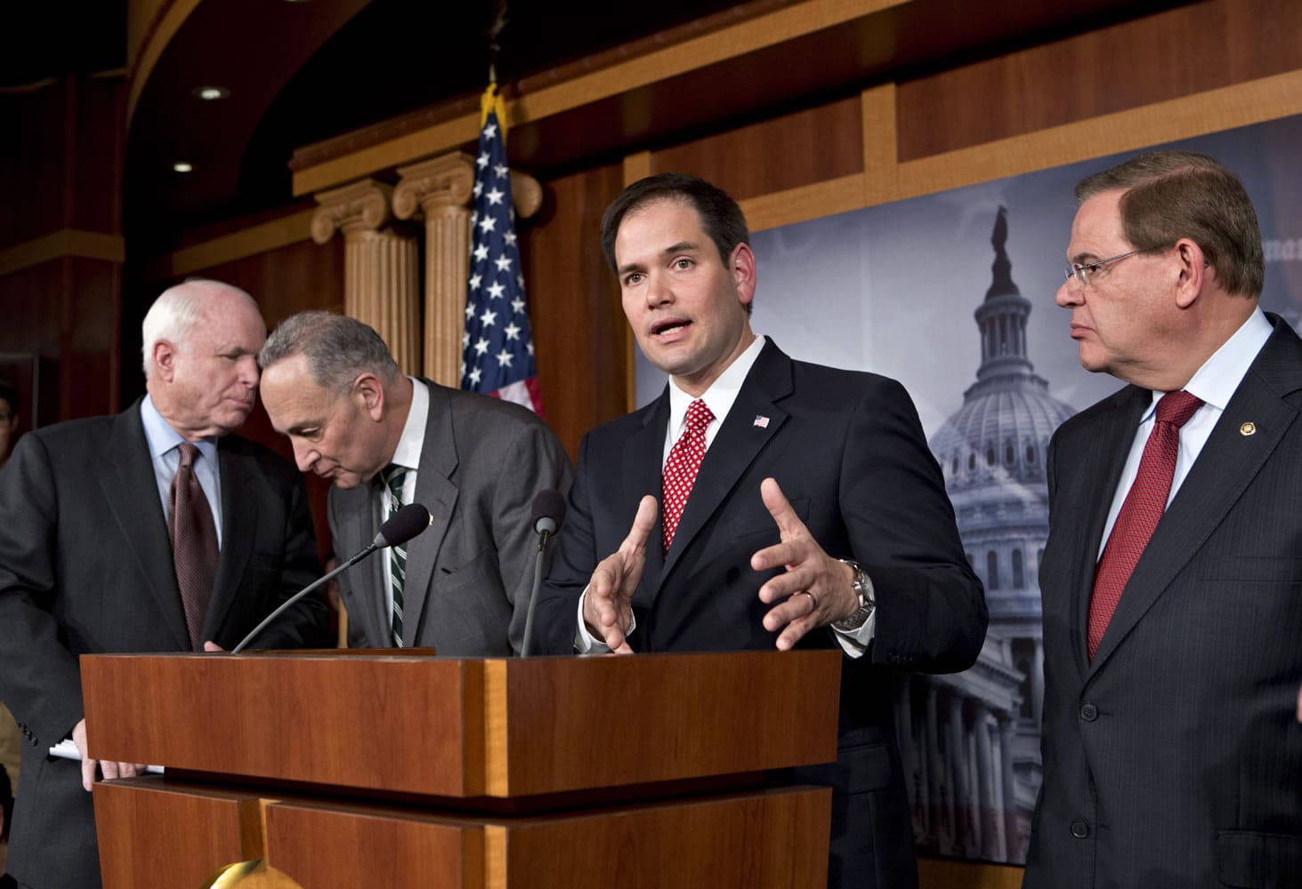 Sen. Marco Rubio, R-Fla., center, speaks at a Capitol Hill news conference on immigration legislation with a members of a bipartisan group of leading senators, including, from left, Sen. John McCain, R-Ariz., Sen. Chuck Schumer, D-N.Y. and Sen.