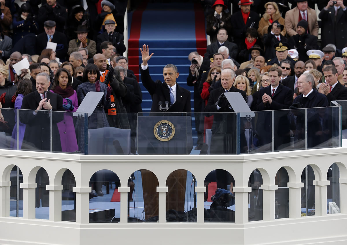 President Barack Obama waves to crowd after his Inaugural speech at the ceremonial swearing-in on the West Front of the U.S.