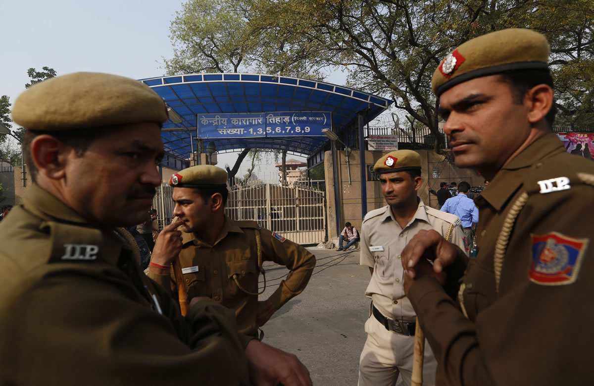 Indian policemen stand outside the Tihar Jail, the largest complex of prisons in South Asia, in New Delhi, India, on Monday.