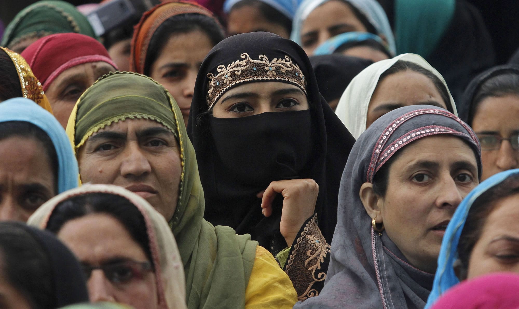 Kashmiri Muslim women workers of Accredited Social Health Activist attend a protest to mark May Day in Srinagar, India, on Wednesday.