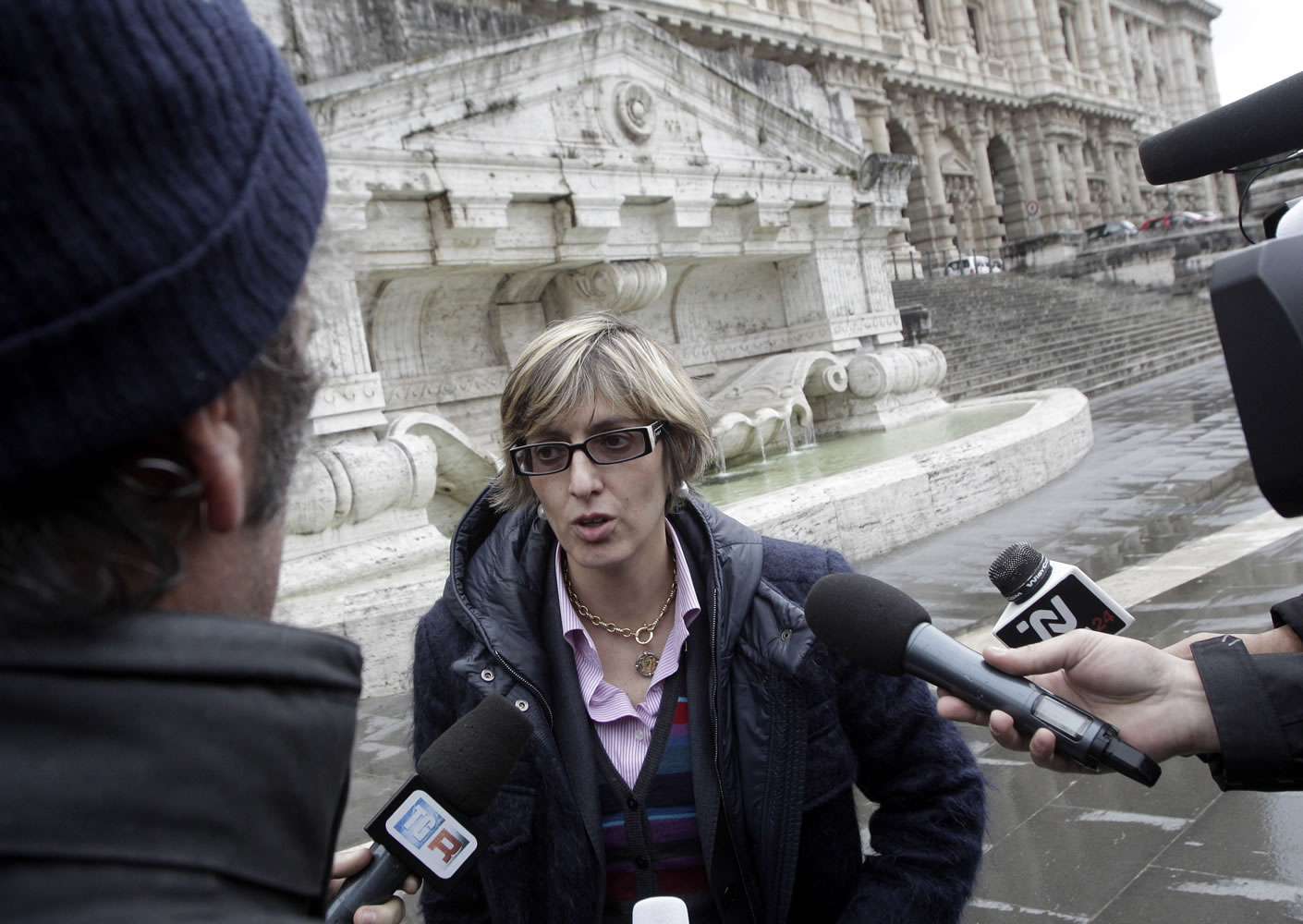 Giulia Bongiorno, lawyer for Amanda Knox's ex-boyfriend, Raffaele Sollecito, talks to reporters in front of the Italy's Court of Cassation in Rome on Monday.