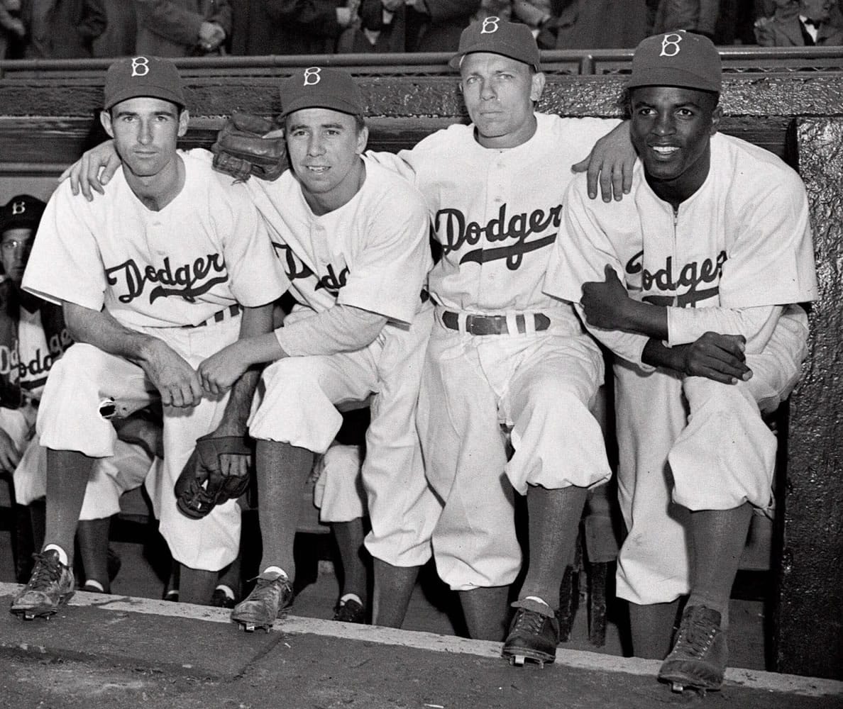 From left, Brooklyn Dodgers baseball players John Jorgensen, Pee Wee Reese, Ed Stanky and Jackie Robinson pose at Ebbets Field in New York on April 15, 1947.