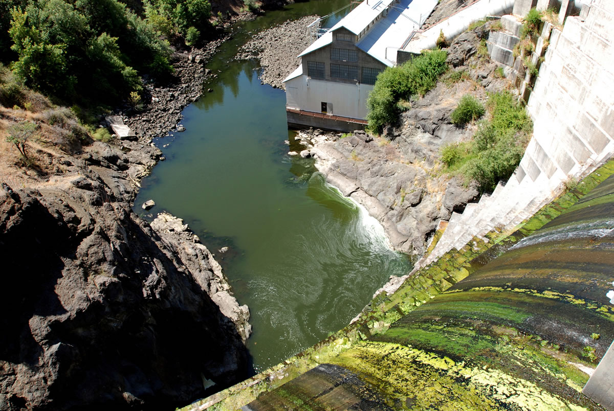 Water trickles over Copco 1 Dam on the Klamath River outside Hornbrook, Calif. The process to relicense the hydroelectric dam system on the Klamath River has started again.