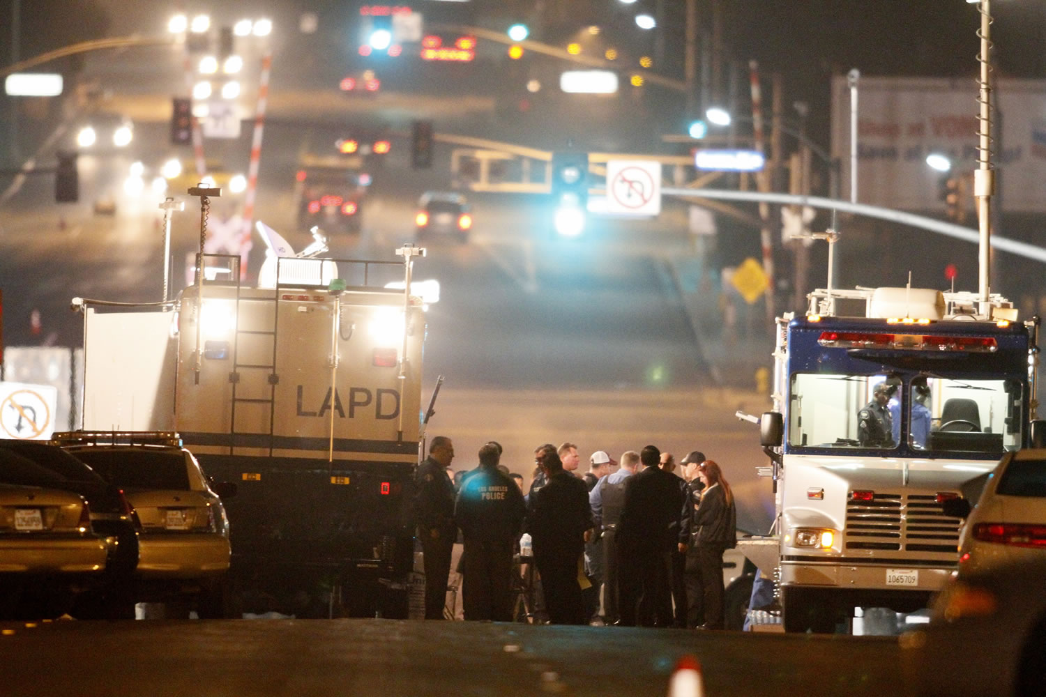 A command post on Magnolia overpass over Interstate 15 is set up in Corona, Calif., on Thursday.