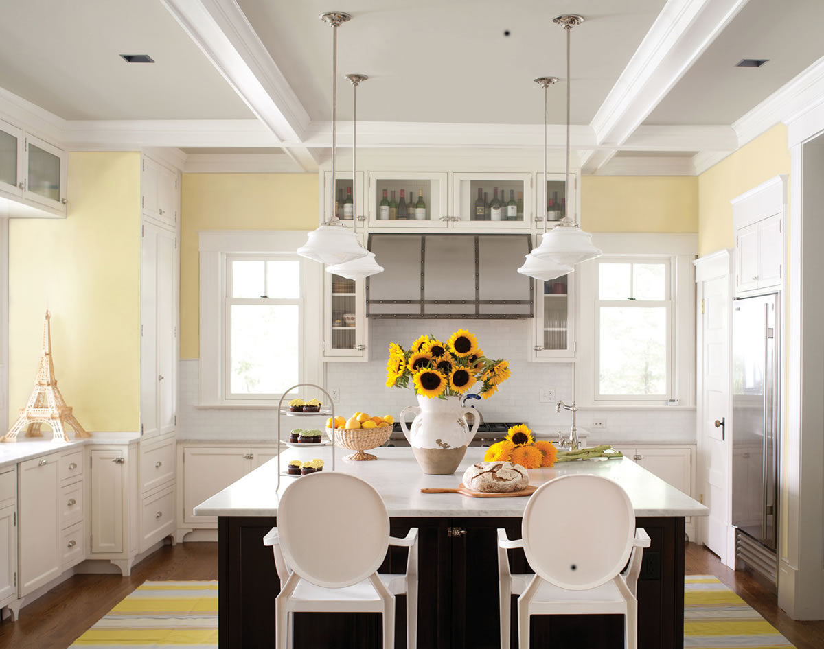 Kansas City Star
Lemon Sorbet by Benjamin Moore can work well in any kitchen. In this kitchen, the pastel yellow is paired with white to highlight all the decorative and architectural accents as well as the dark wood island, offering balance and contrast.