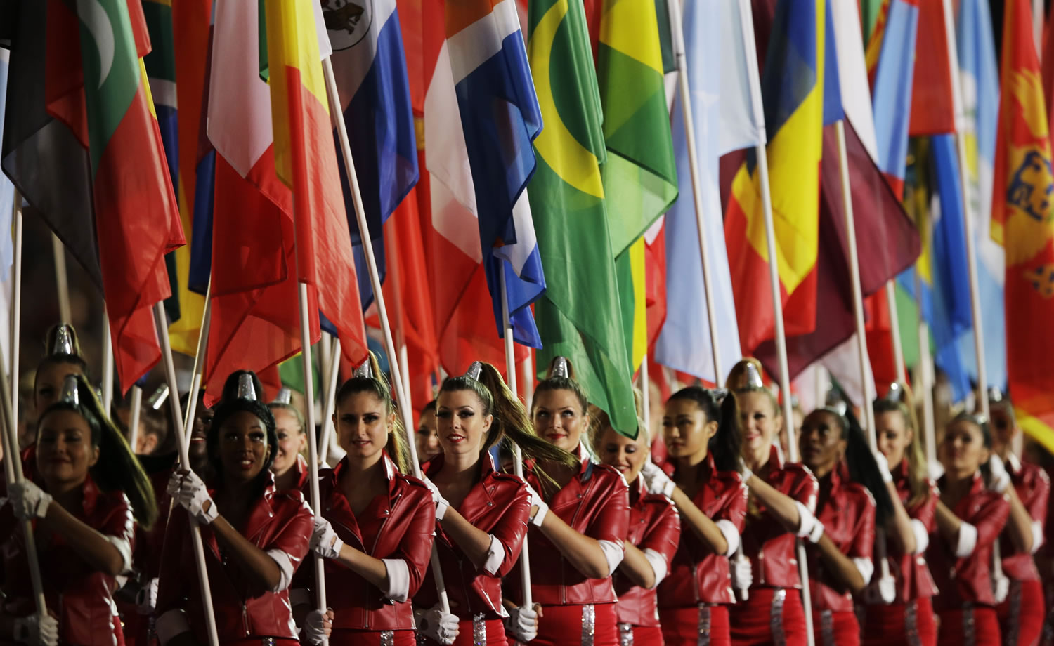 Flag bearers parade during the closing ceremony in London.