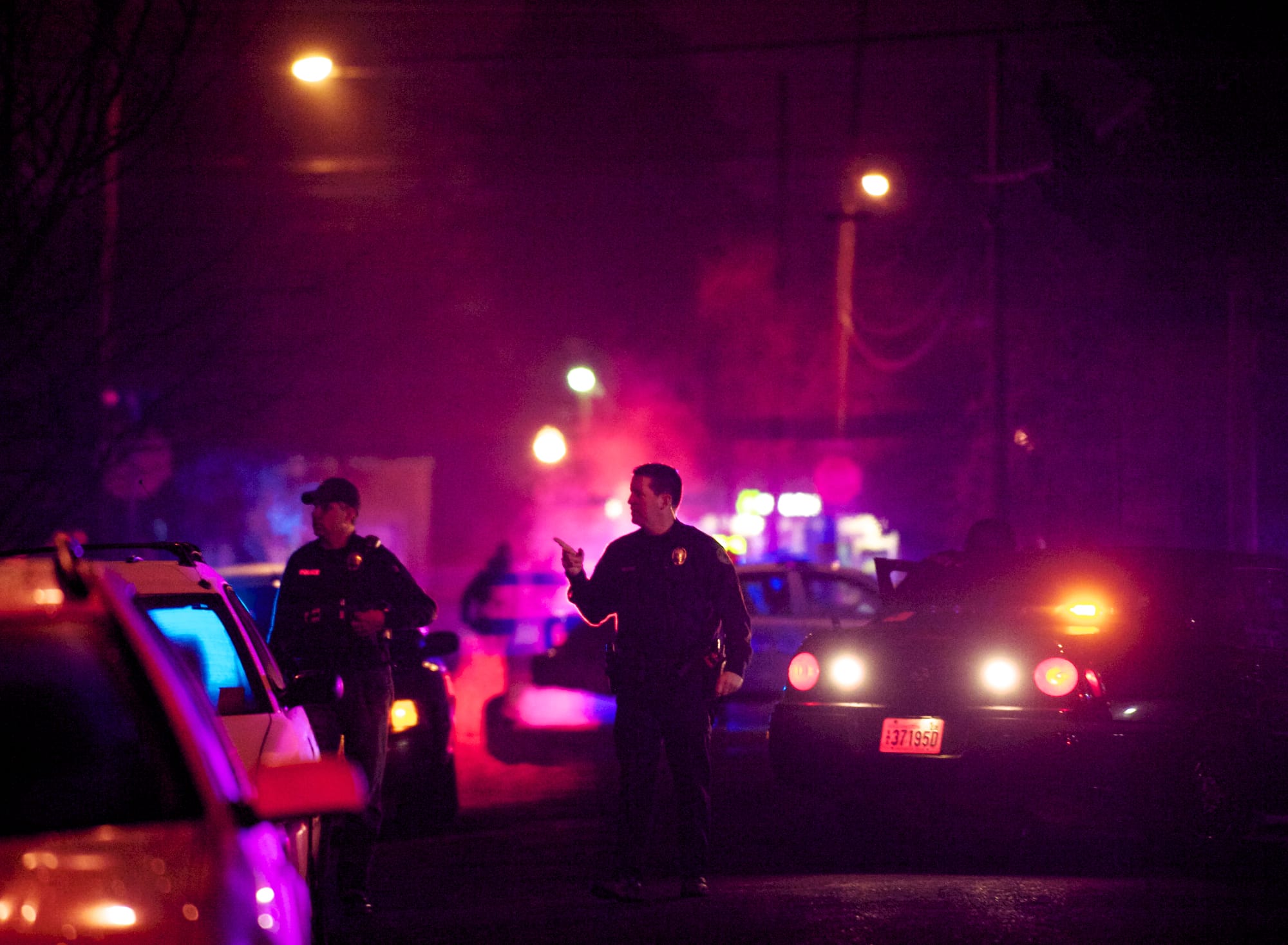 Police converge in Vancouver's Arnada neighborhood after an officer-involved shooting late Friday.