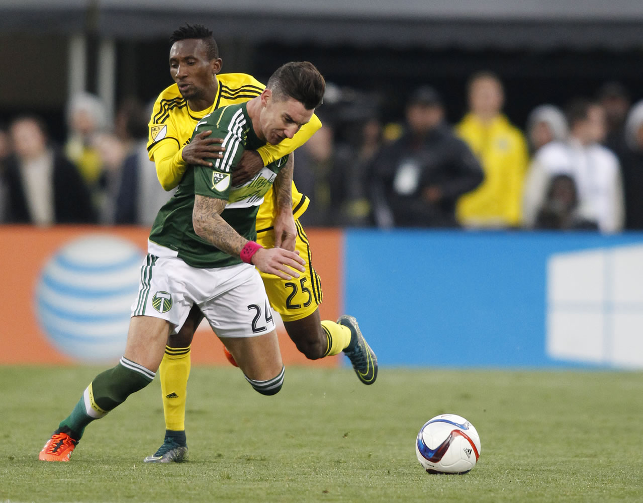 Portland Timbers defender Liam Ridgewell (24), pictured battling Harrison Afful of Columbus in the MLS Cup final, is looking forward to playing on Sunday in front of the Timbers fans.