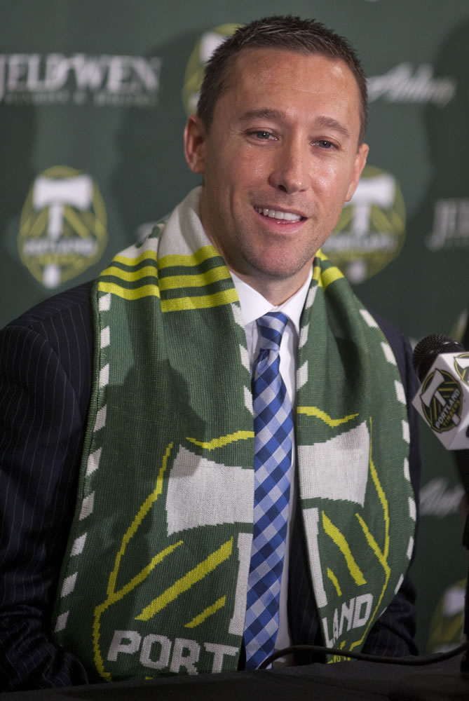Associated Press photo
Timbers' coach Caleb Porter meets the media and makes some pointed comments about the team's striker.