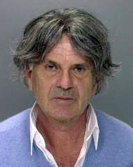 In this undated photo released by the Philadelphia Police Department, Philippe Jernnard of La Rochelle, France is shown.  Jernnard, a 61-year-old French man was arrested Wednesday March 20, 2013 at Philadelphia International Airport and charged with impersonating a pilot after airline officials found him in the cockpit of a plane scheduled for takeoff.
