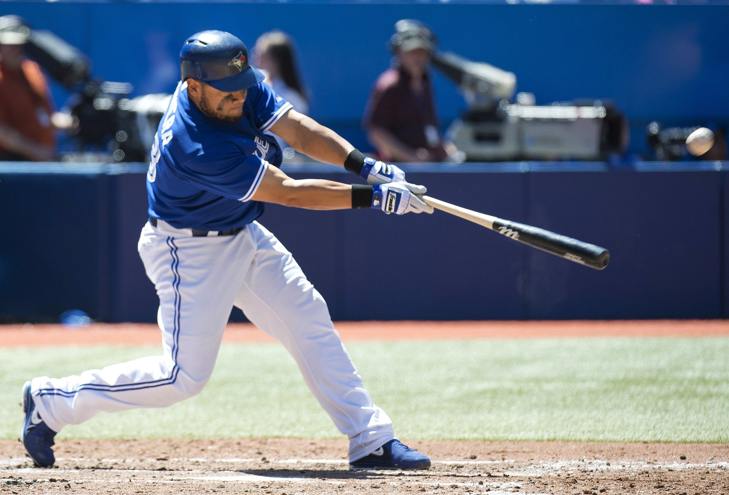 Toronto's Melky Cabrera hits a solo home run in the fifth inning Sunday.
