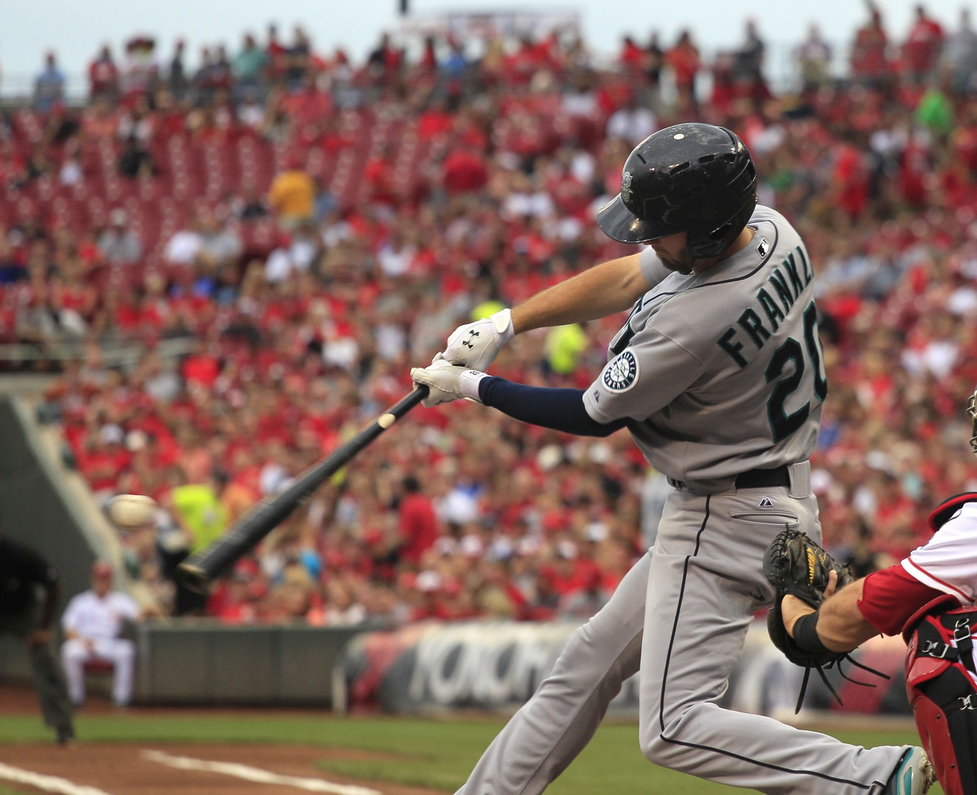 Seattle's Nick Franklin hits a two-run home run in the first inning Friday at Cincinnati.