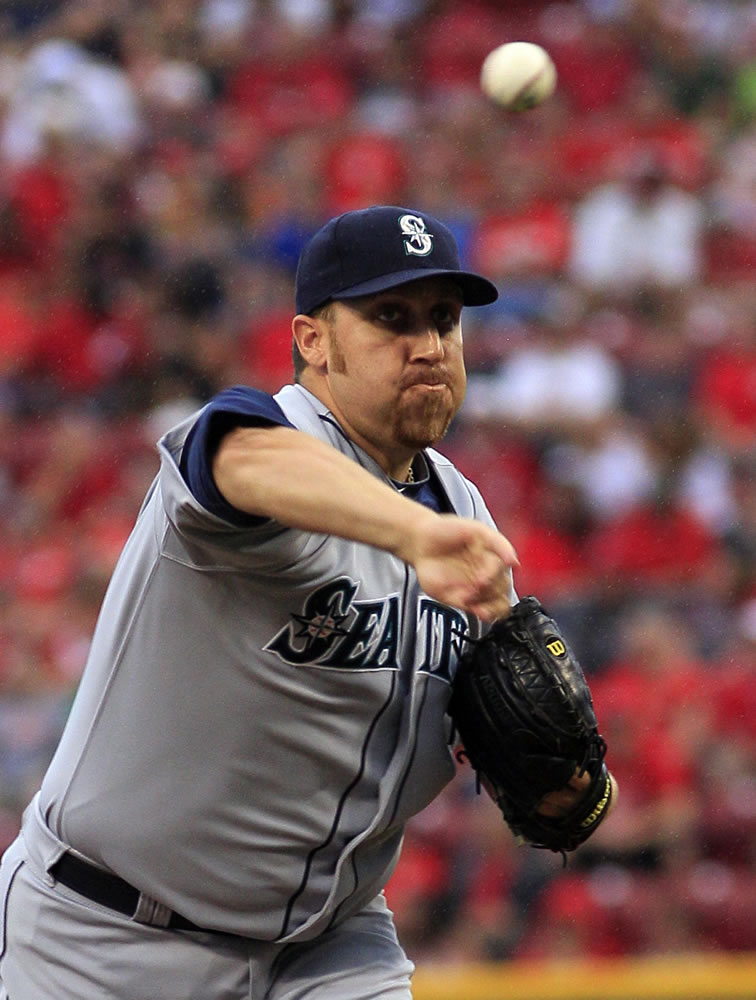 Seattle Mariners' Aaron Harang limited his former team to a pair of runs and six hits over six innings on Friday.