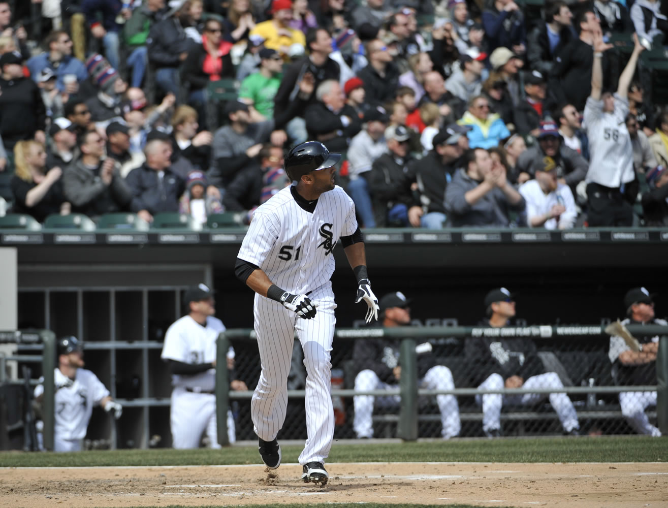 Chicago White Sox's Alex Rios watches his two-run home run off of Seattle Mariners starting pitcher Felix Hernandez in the sixth inning Saturday.