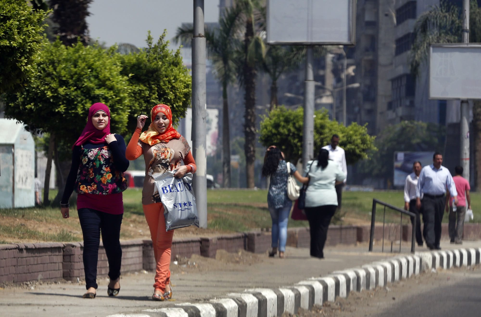 People walk in Cairo, Egypt, on Tuesday.