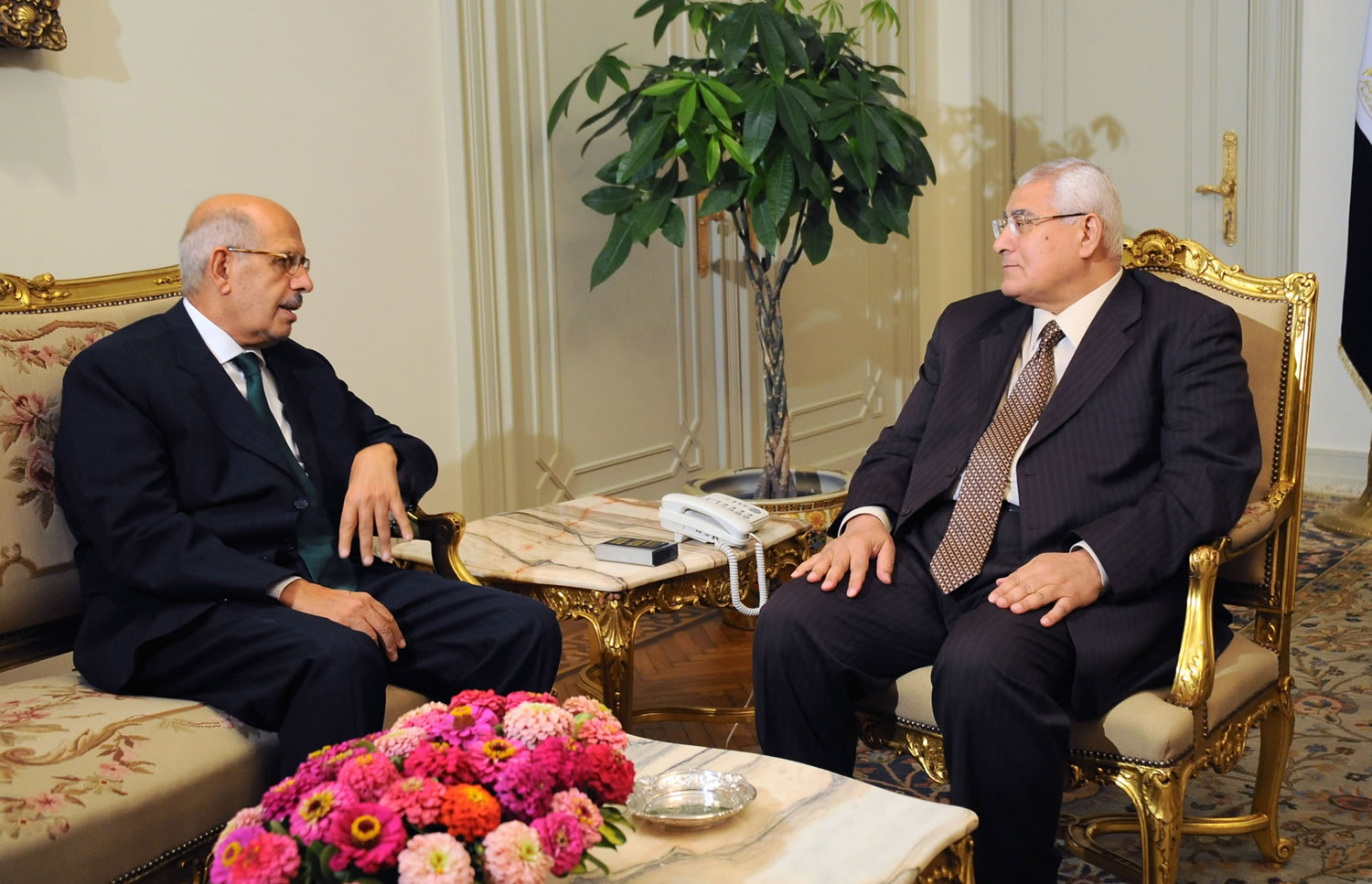Newly-appointed interim Prime Minister Mohamed Elbaradei, left, meeting with interim president Adly Mansour, right, at the presidential palace.