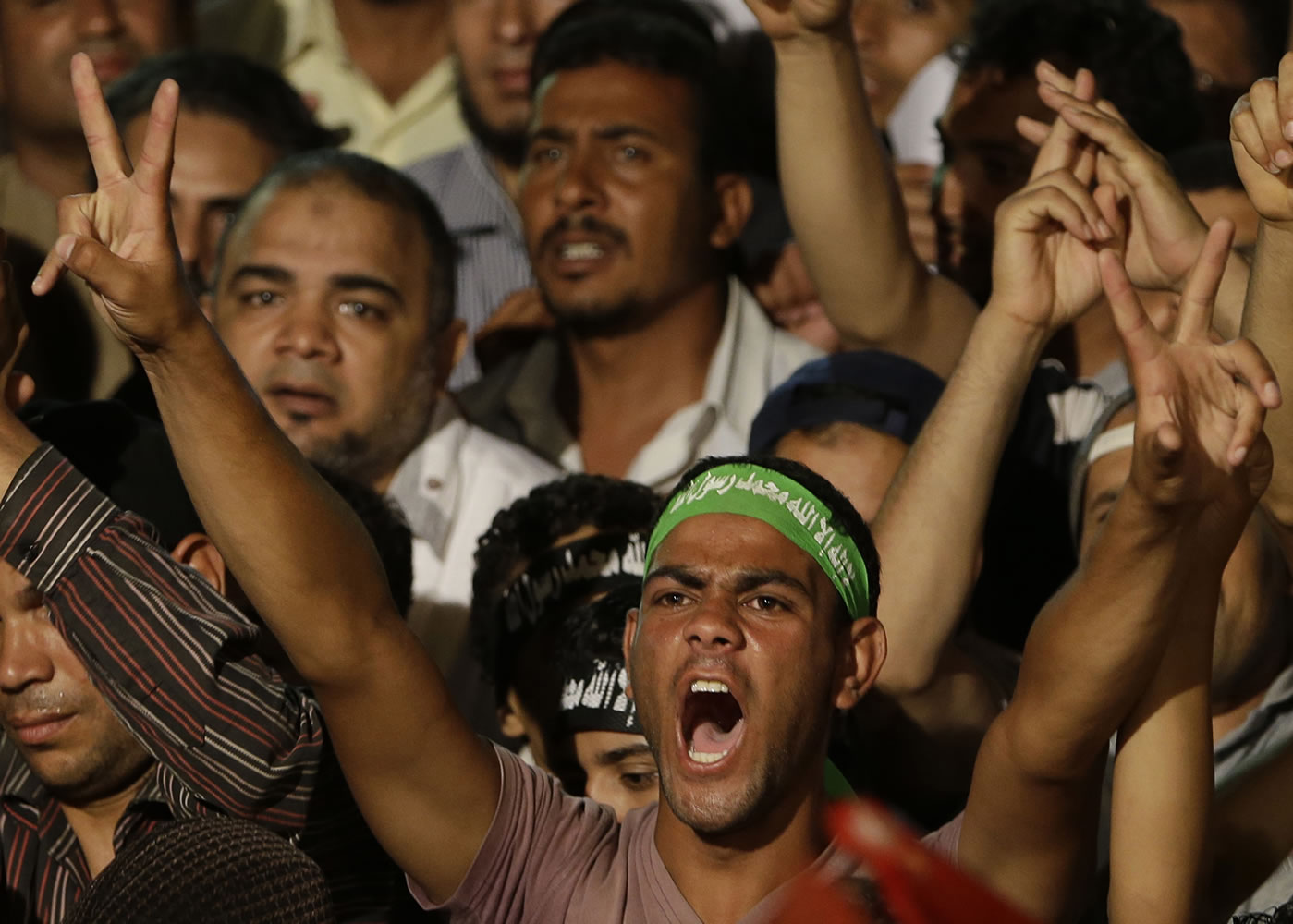 Supporters of ousted Egyptian President Mohammed Morsi shout slogans during a demonstration Wednesday in Nasr City, Cairo, Egypt.