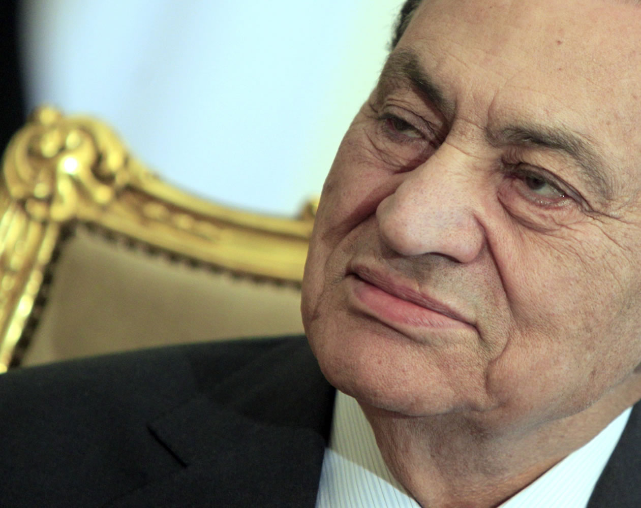 Former Egyptian President Hosni Mubarak sits during his meeting with Emirates foreign minister, not pictured, at the Presidential palace in Cairo, Egypt, on Feb.