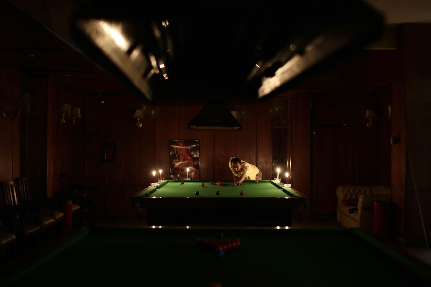 Egyptian men play snooker at a club in the Mohandessin district, in Giza, Egypt, on Saturday.