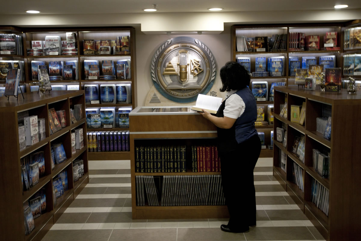 A librarian goes through books at the library of the Scientology center in the port city of Jaffa Tel Aviv, Israel on Nov. 7.