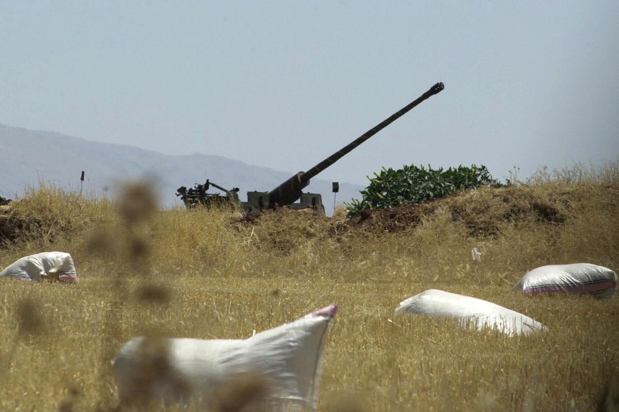 A Syrian anti-aircraft gun is positioned in a wheat field close to the radar position in eastern Lebanon's Bekaa valley.