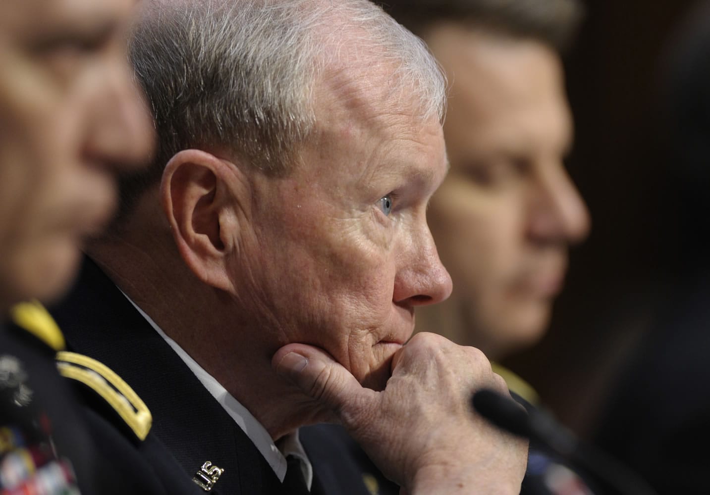 Joint Chiefs Chairman Gen. Martin Dempsey listens on Capitol Hill in Washington on Tuesday during the Senate Armed Services Committee hearing on pending legislation regarding sexual assaults in the military. Army Chief of Staff Gen.