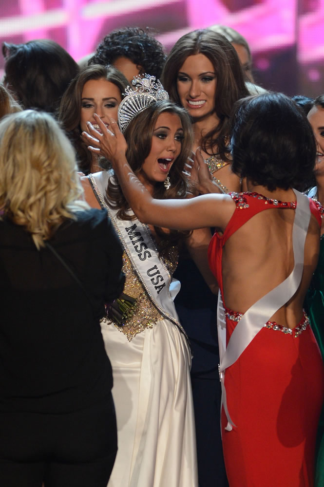 Miss Connecticut Erin Brady, center, reacts after winning the Miss USA 2013 pageant on Sunday in Las Vegas.