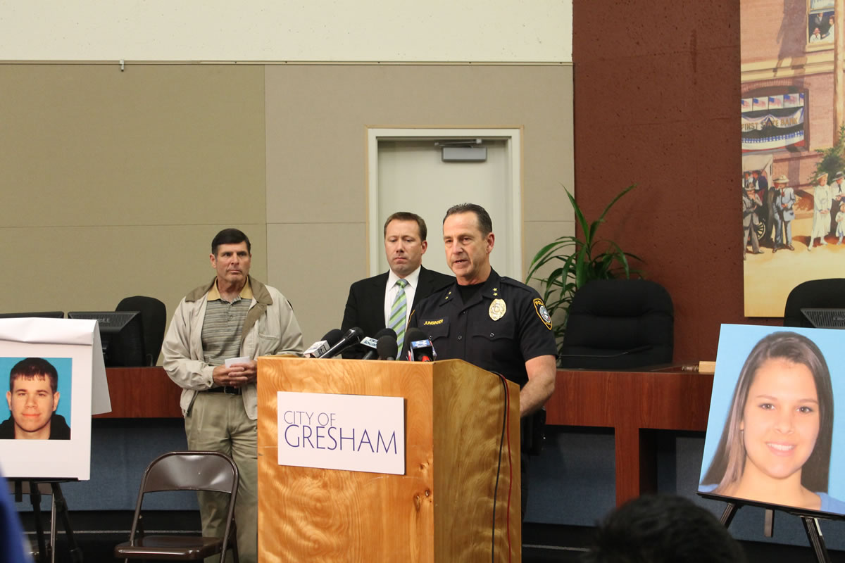 Gresham Police Chief Craig Junginger (right) announces the discovery of Whitney Heichel's body and the arrest of Jonathan Holt, whose face is seen far left.