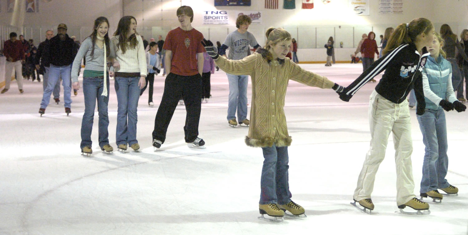 People skate at Mountain View Ice Arena.