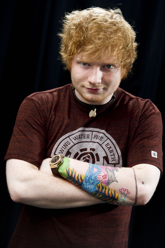 Musician Ed Sheeran, who wrote the pop ballad &quot;Moments,&quot; performed by One Direction, recently wrote and recorded songs with Taylor Swift for her upcoming fourth album &quot;Red.&quot;