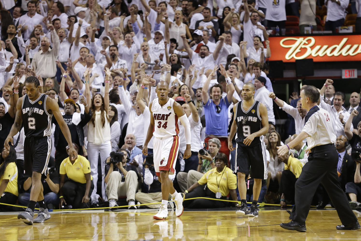 Miami Heat shooting guard Ray Allen (34) reacts to shot that took the game into overtime inf Game 6 of the NBA Finals on Wednesday in Miami.