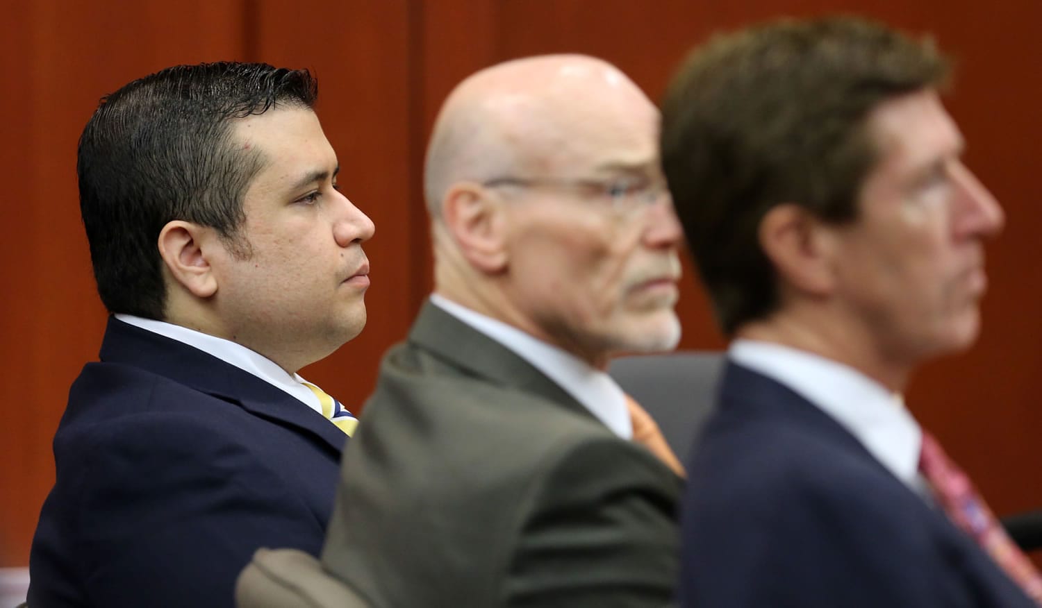 George Zimmerman, left, sits with his defense lawyers, Don West, center, and Mark O'Mara, during the 15th day of his trial in Seminole circuit court in Sanford, Fla., on Friday.