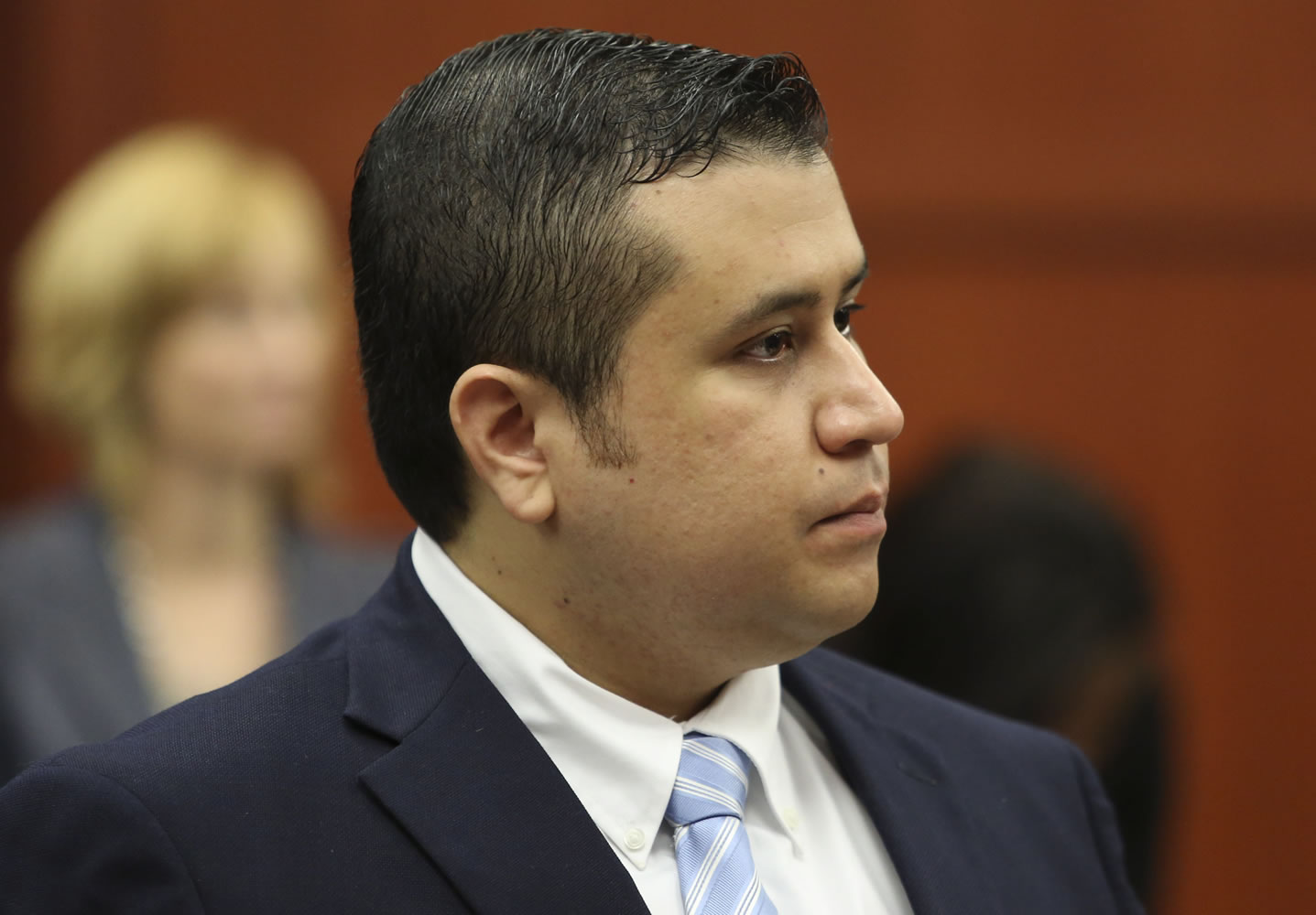 George Zimmerman stands for potential jurors as they enter the courtroom for his trial in Seminole circuit court in Sanford, Fla., on Thursday.