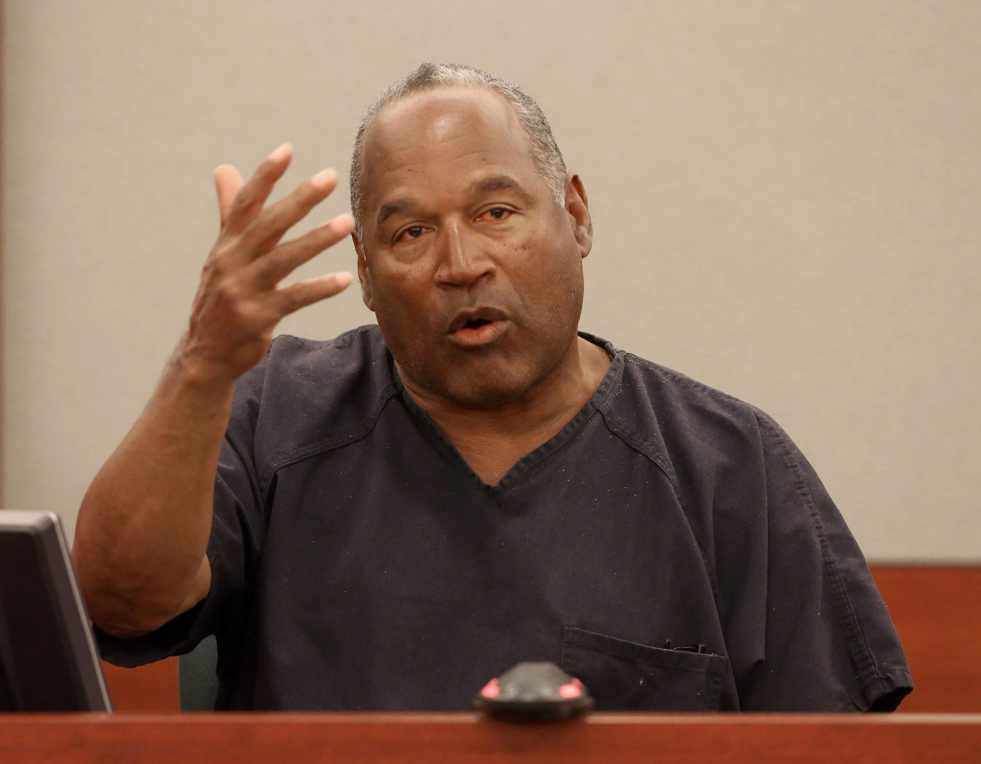 O.J. Simpson testifies listens during an evidentiary hearing in Clark County District Court on Wednesday in Las Vegas.